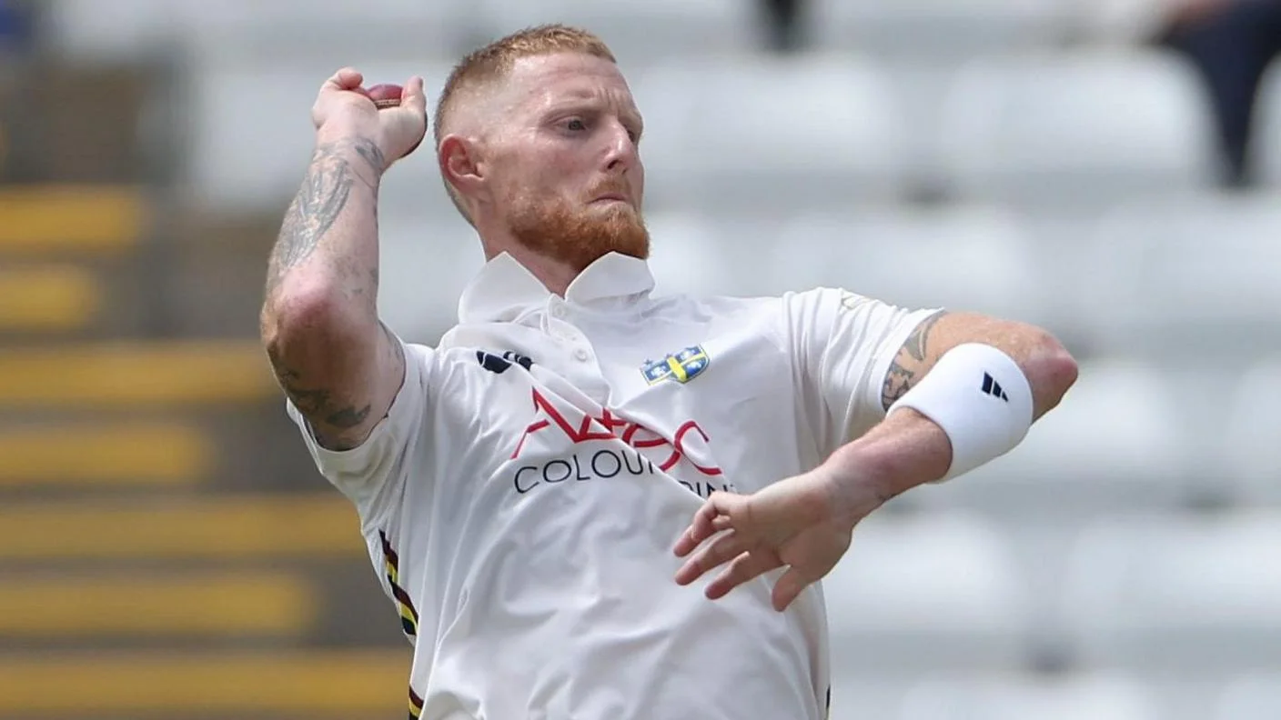 Ben Stokes in a white Durham shirt bowling