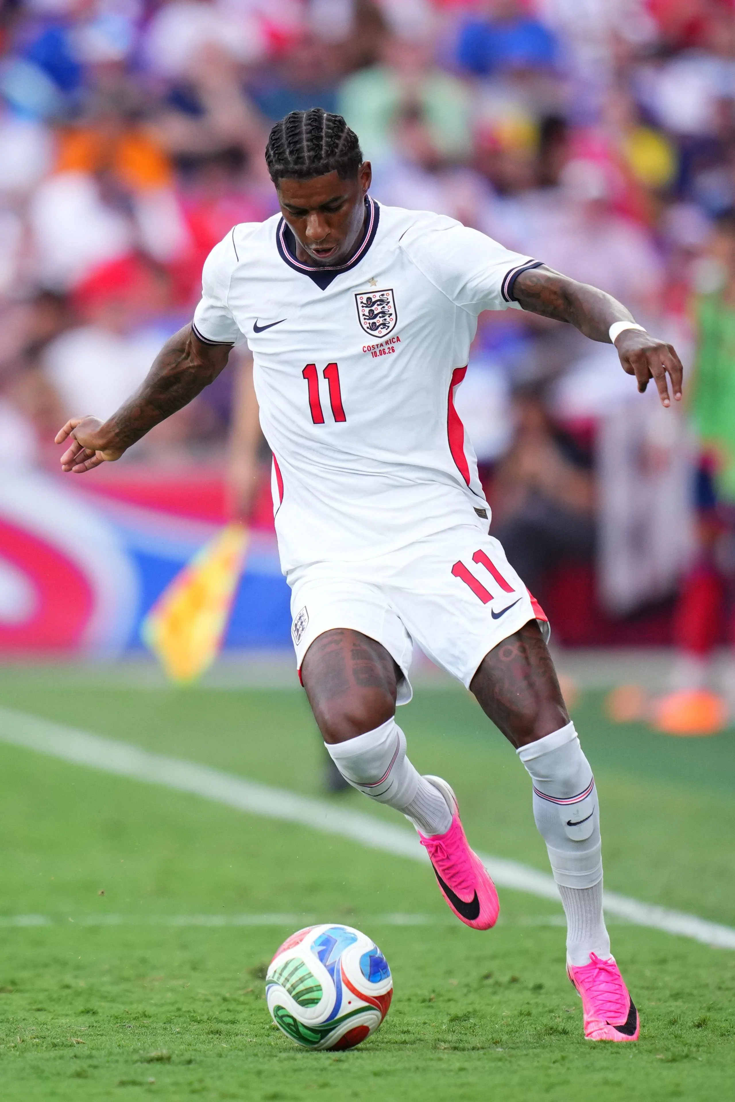 Marcus Rashford running with the ball for England